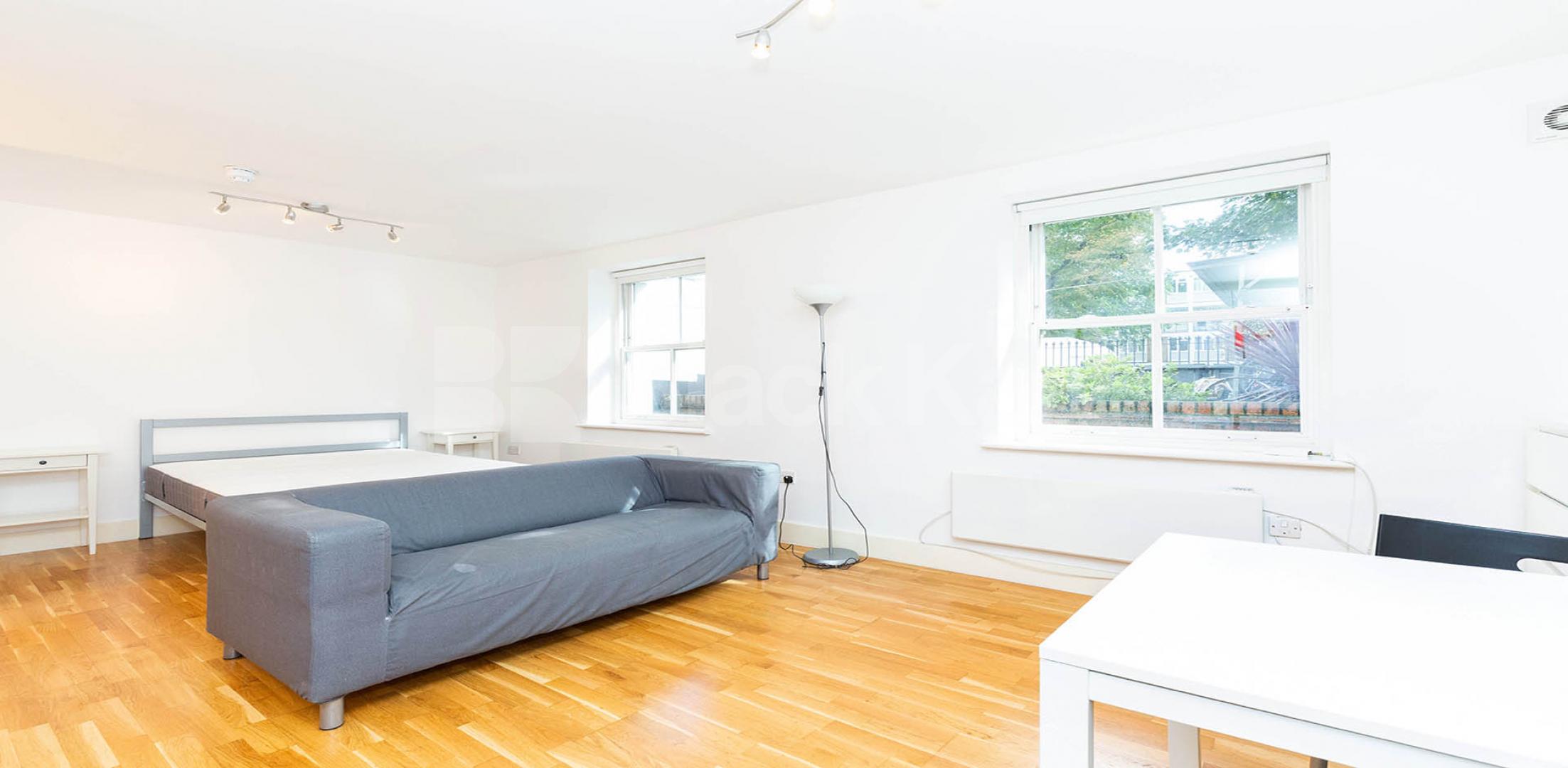 A fantastic spacious studio set within a gated double fronted house Camden Road , Camden Borders 